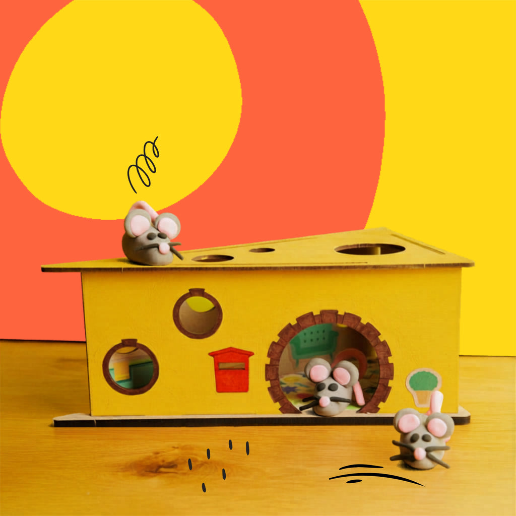 Max the Mouse craft kit by Dabble & Co. featuring modeling clay, a wooden cheese, and all necessary tools for kids.
