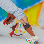 Dabble & Co. Dot the Dog complete craft kit: an all-in-one DIY set with a wooden dog, foam ears, fabric bandana, textile markers, air-dry clay, and buttons.