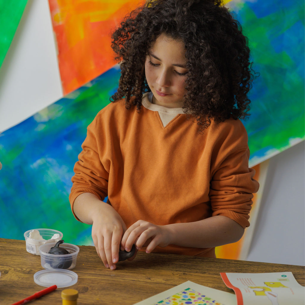 A young maker following the step-by-step instructions to build their own Max the Mouse project.